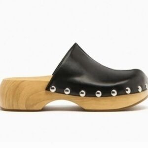 Black rivet trimmed casual shoes